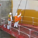 Wrapped up in two coats – Waterproofing in Beverley The white coat goes on top of the yellow to ensure the surface is entirely covered.