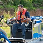 An amphibious tool carrier with pumping attachments.