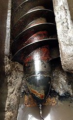 For one site near Hamilton, South Lanarkshire, a pair of Archimedes screw pumps had been identified as requiring new bottom bearings and remaking of the concrete troughs.
