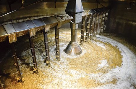 Distilleries are exploring ways to feed waste heat back into different stages of whiskey production, like the mash tun.