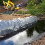 A river runs through it: Utility completes key diversion work during pipe installation project near Glasgow