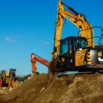 Tracked excavator helps recycling firm keep on top of inert material