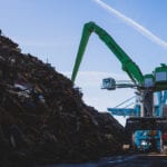 Metal recycling group unveils new hybrid material handler at Liverpool Alexandra Docks