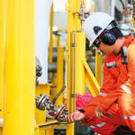 Sponsored content: Portable VOC detector scores on carbon and employee hygiene worker checking gas valve