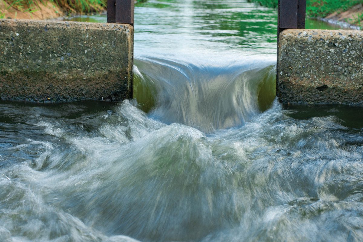 Water rushing through a gate or weir system