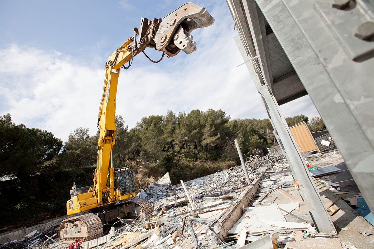 Heavy-lifting equipment on demolition site