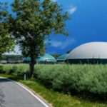 Optimise your anaerobic digestion site with a weather station expertly installed by Skyview round roofed buildings surrounded by trees and bushes