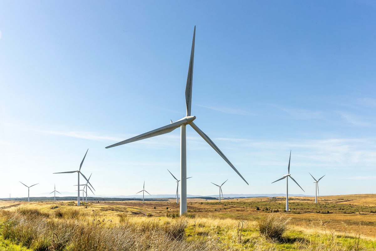 A wind farm in Scotland with surrounding moorland
