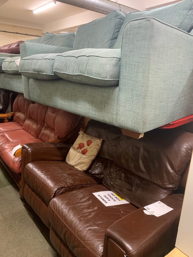 Second-hand sofas at a furniture reuse centre