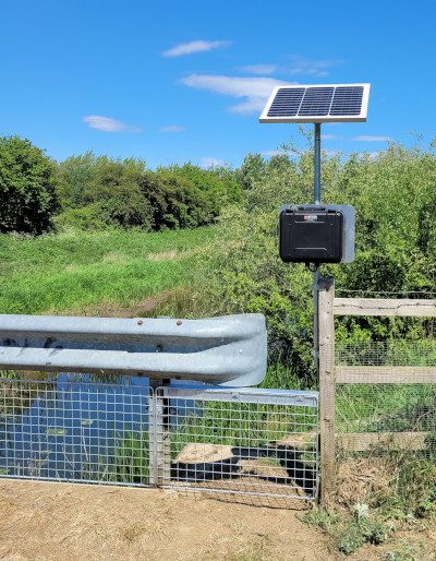 Solar-powered portable remote water quality monitoring station installed beside a waterway in Kent.